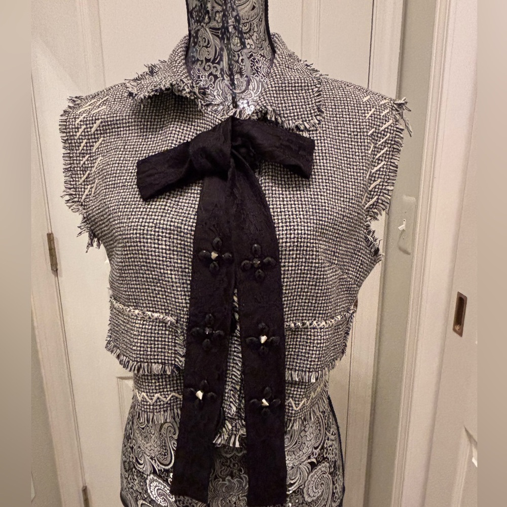 Black and white checked vest with tie